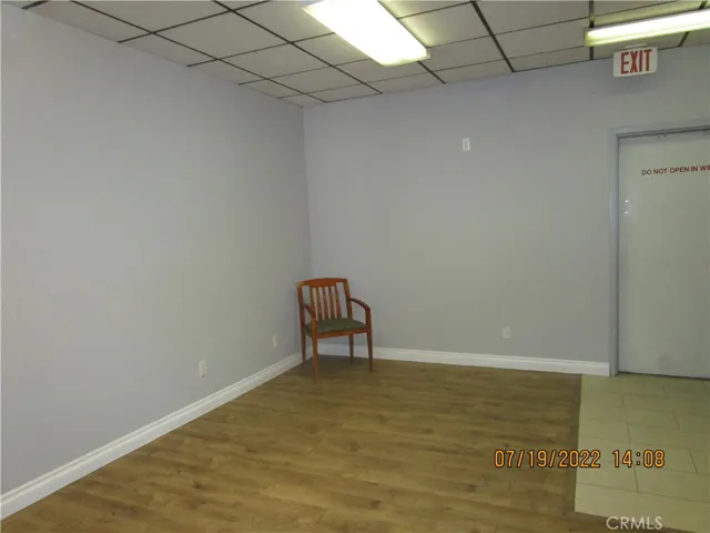 multipurpose room with rear access door to rear parking lot.