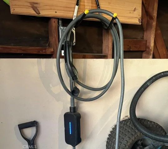 BMW EV Flexible fast charger cable in garage