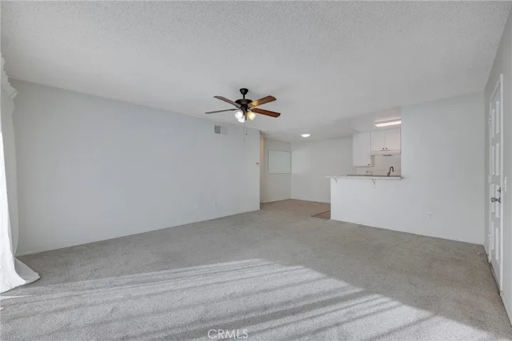 Living room, dining, not staged