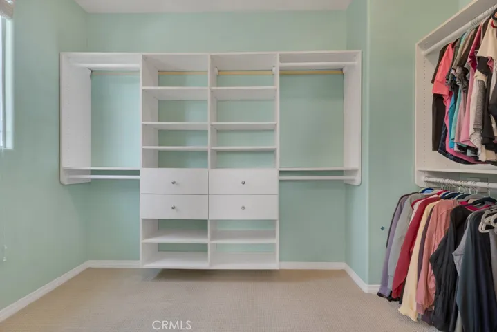 Walk in closet in primary suite