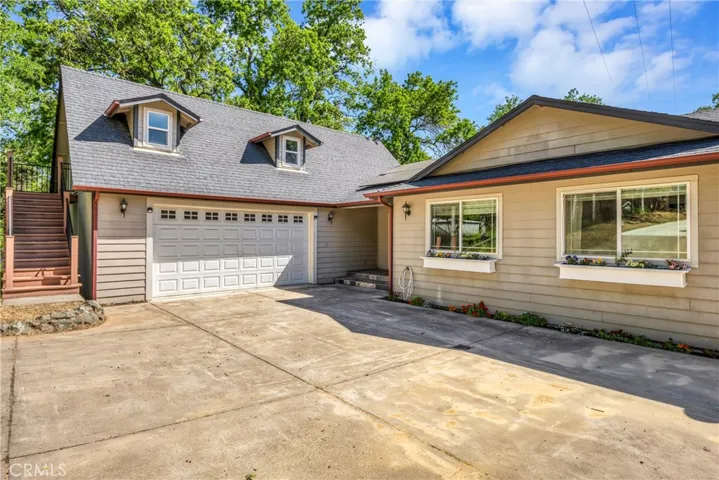 Oversized attached garage with finished studio above