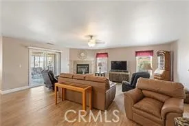 Open living area designed for comfort , a cozy fire and entertaining.