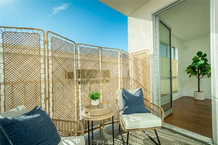 Balcony accessible from Bedroom 1 and Living Room