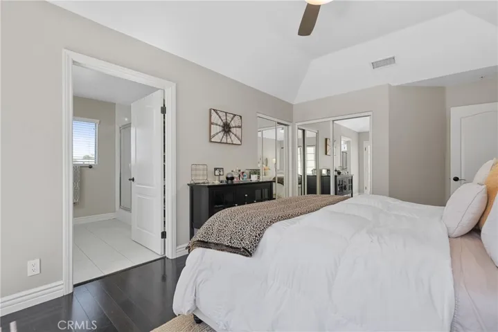 Mirrored closet doors add depth and light.