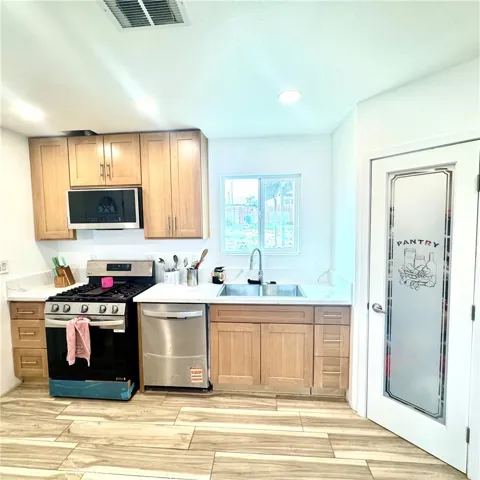 Kitchen: sink area with window of outside view