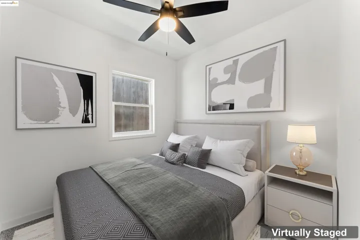 Bedroom featuring a ceiling fan