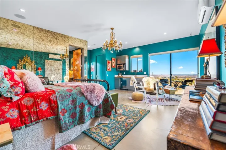 Casita bedroom with kitchen, bathroom and walk in closet