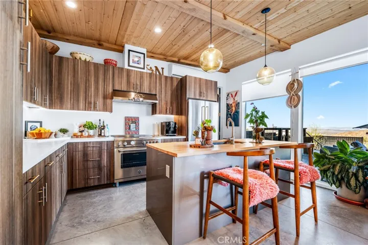 Kitchen with view from oversize slider