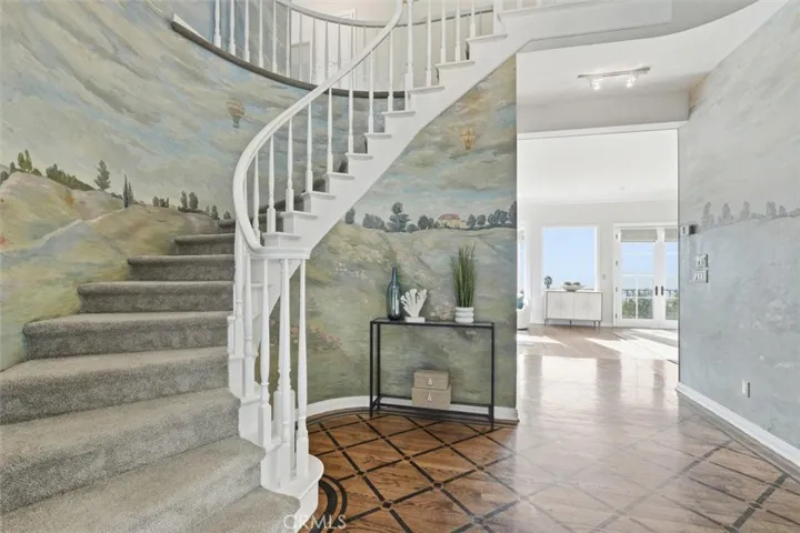 Grand entrance with hand-painted mural