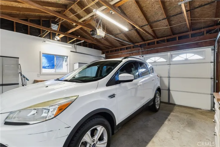 Attached garage - Car is sold and not included in sale