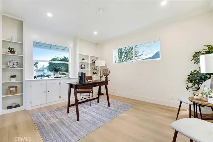Front bedroom staged as an office