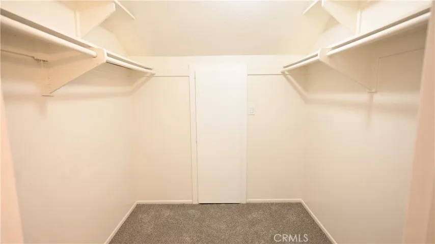 MASTER BEDROOM WALK IN CLOSET