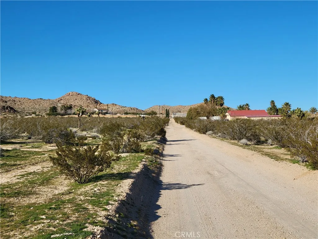 Banta Ln - property is on the left. Custom homes in the area.