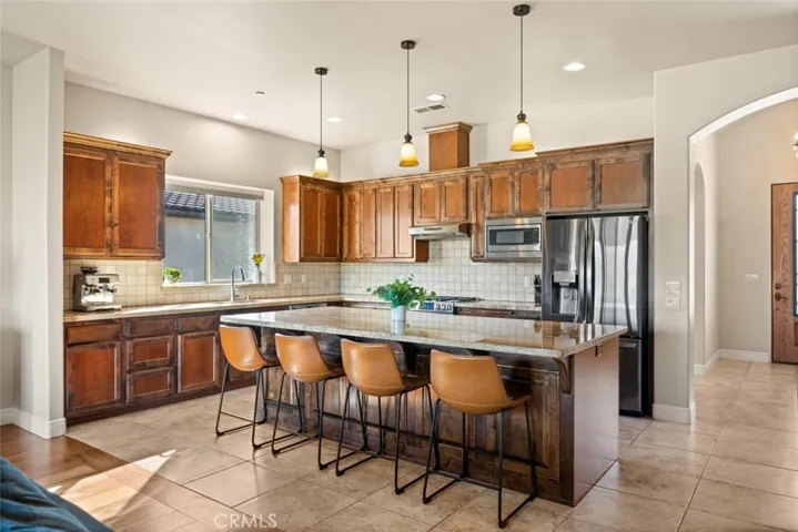Large kitchen island open to the living room.
