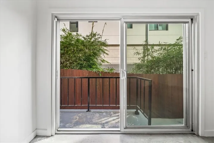 Large sliding door to the outdoor walking path