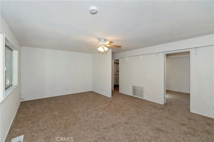 Unit 1 bonus room. Could be part of a primary suite, a family room or man cave