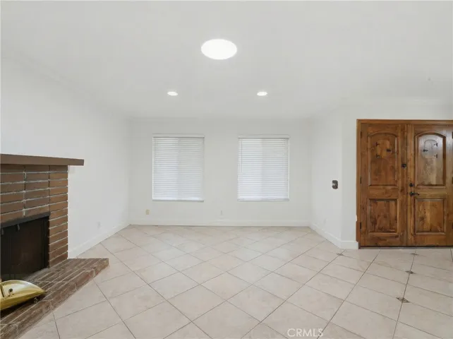 Living Room with fireplace looking toward front door
