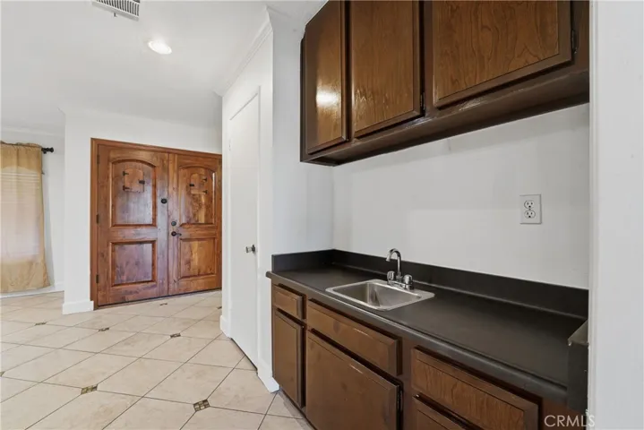 Mini bar/flex prep space within living room