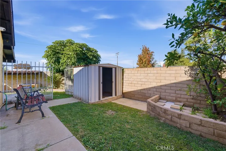 Back side yard with Storage