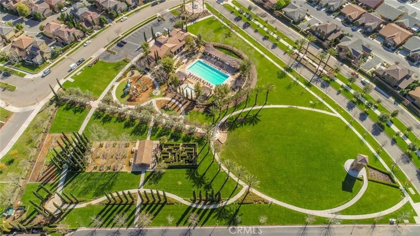 Harlan Ranch Amphitheater and the community center with pool, picnic area, green maze, and playground. Enjoy a good life at this beautiful planned community.