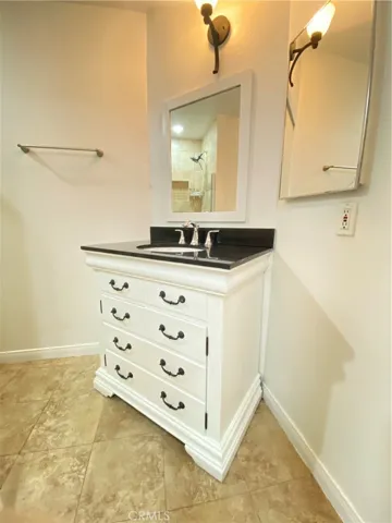 Some photos have been virtually staged to showcase the home's potential. No physical changes or furnishings are present