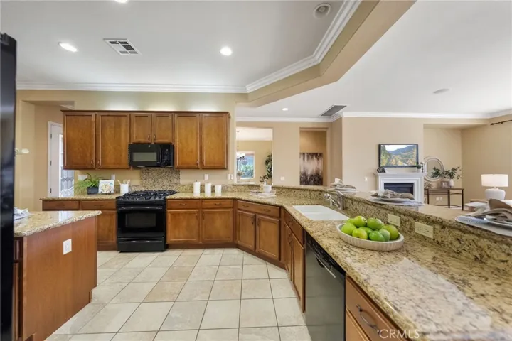 Very large kitchen- cabinets have custom roll-outs for convenience and and ease of storage