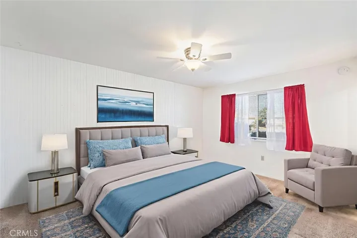 The master bedroom is virtually staged.