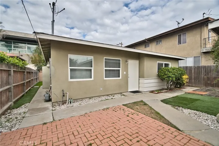 Yard area for the apartment & main entry