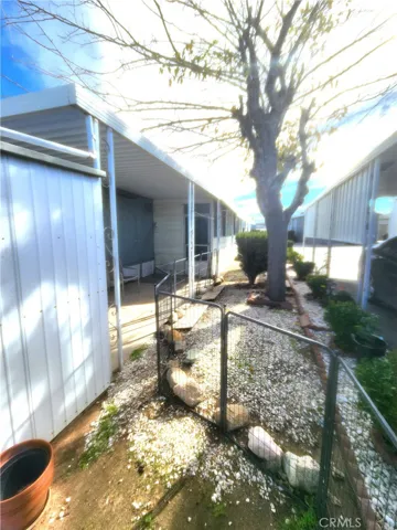 Side Yard With Covered Patio