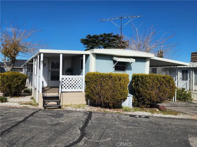 Front With Covered Patio