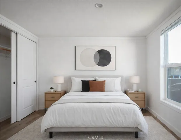 Please note that the image shown is a virtually staged representation of the room and is intended to provide a visual concept of the space. The actual room may differ in appearance, and the furniture and decor depicted are not included in the sale. For an accurate understanding of the property's current condition and layout, we encourage you to view the home in person. Thank you 

