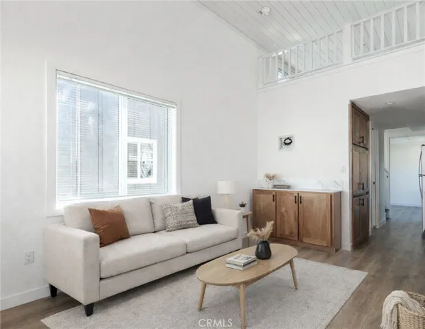 Please note that the image shown is a virtually staged representation of the room and is intended to provide a visual concept of the space. The actual room may differ in appearance, and the furniture and decor depicted are not included in the sale. For an accurate understanding of the property's current condition and layout, we encourage you to view the home in person. Thank you 
