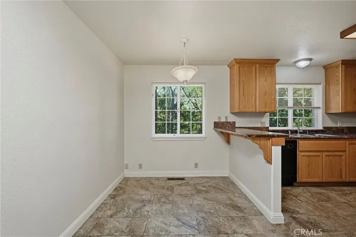 Bar area off of kitchen with casual dining area