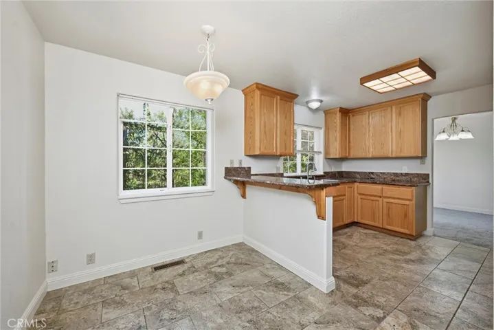 Bar area off of kitchen with casual dining area