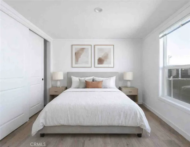 Please note that the image shown is a virtually staged representation of the room and is intended to provide a visual concept of the space. The actual room may differ in appearance, and the furniture and decor depicted are not included in the sale. For an accurate understanding of the property's current condition and layout, we encourage you to view the home in person. Thank you 
