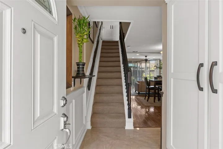 Staircase railing upgraded to wood and wrought iron. Beautiful wainscoting in entry.
Photos from pre-tenant occupancy (2023)