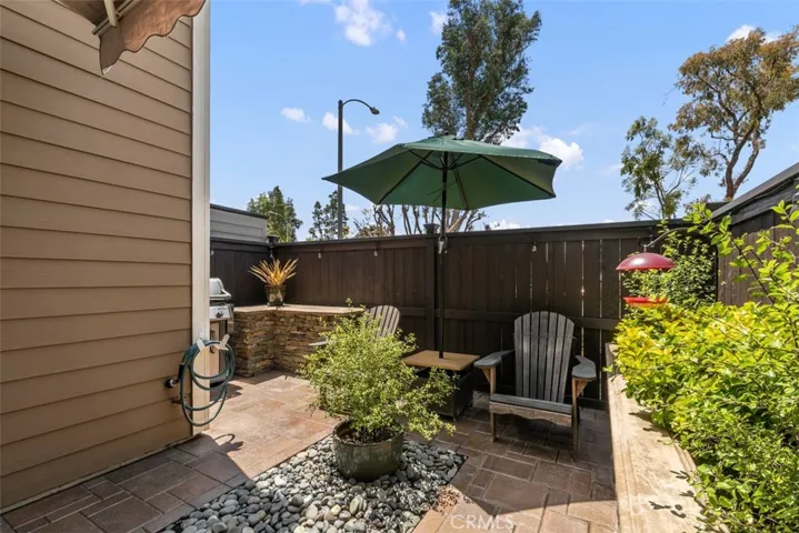 Relaxing backyard patio. One of the rare few units in the neighborhood with a private backyard. 
Photos from pre-tenant occupancy (2023)