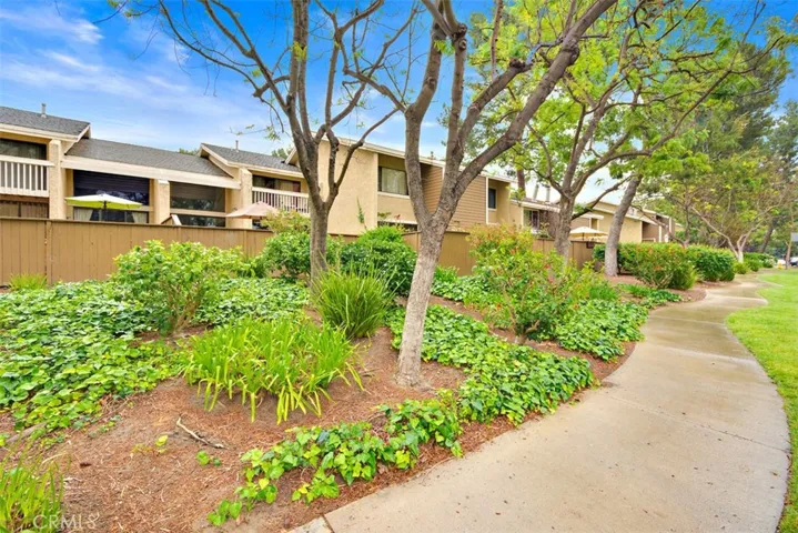 Lots of trees and landscaping with walking paths