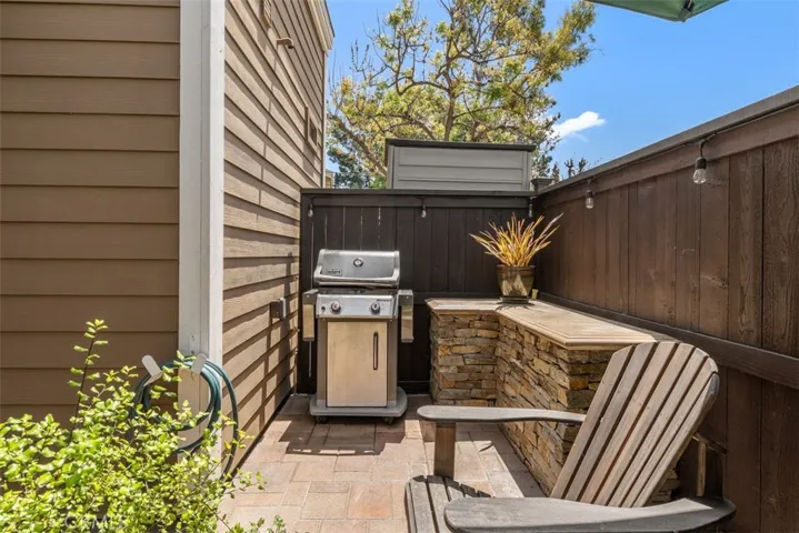 BBQ area with stone ledge. 
Photos from pre-tenant occupancy (2023)