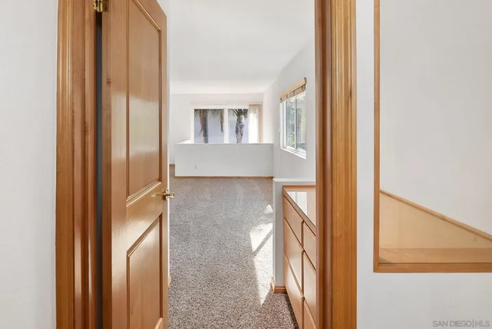 Entry to the primary bedroom. Light and bright.