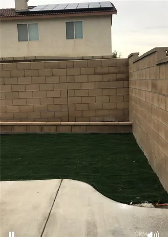 Backyard Concrete and turf