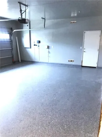 2-car remote controlled garage door, and custom flooring