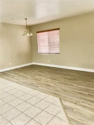 Spacious Formal Living Room with Custom-Vinyl Maple-Washed Oak Wood Designer Floor