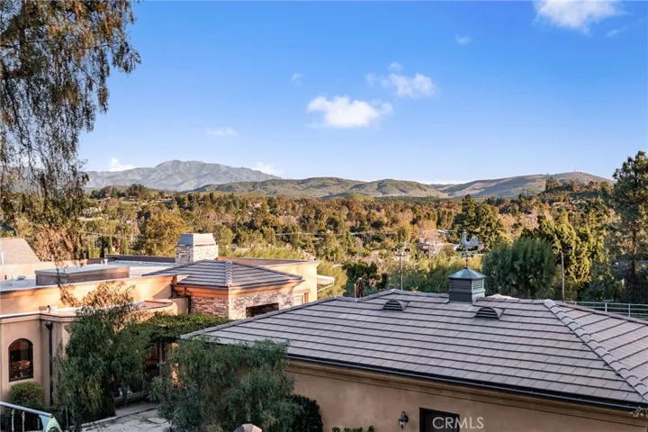 City light and mountain views.