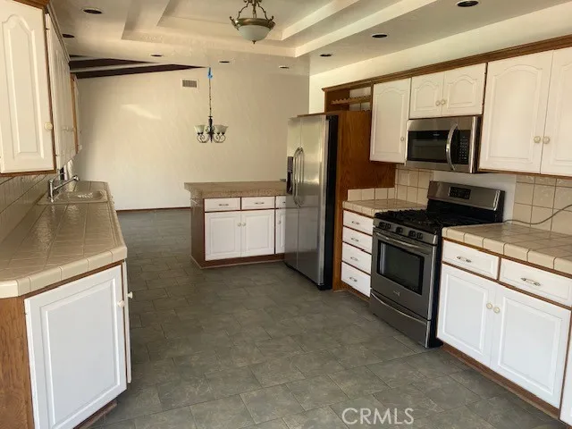 in kitchen looking back to dining area