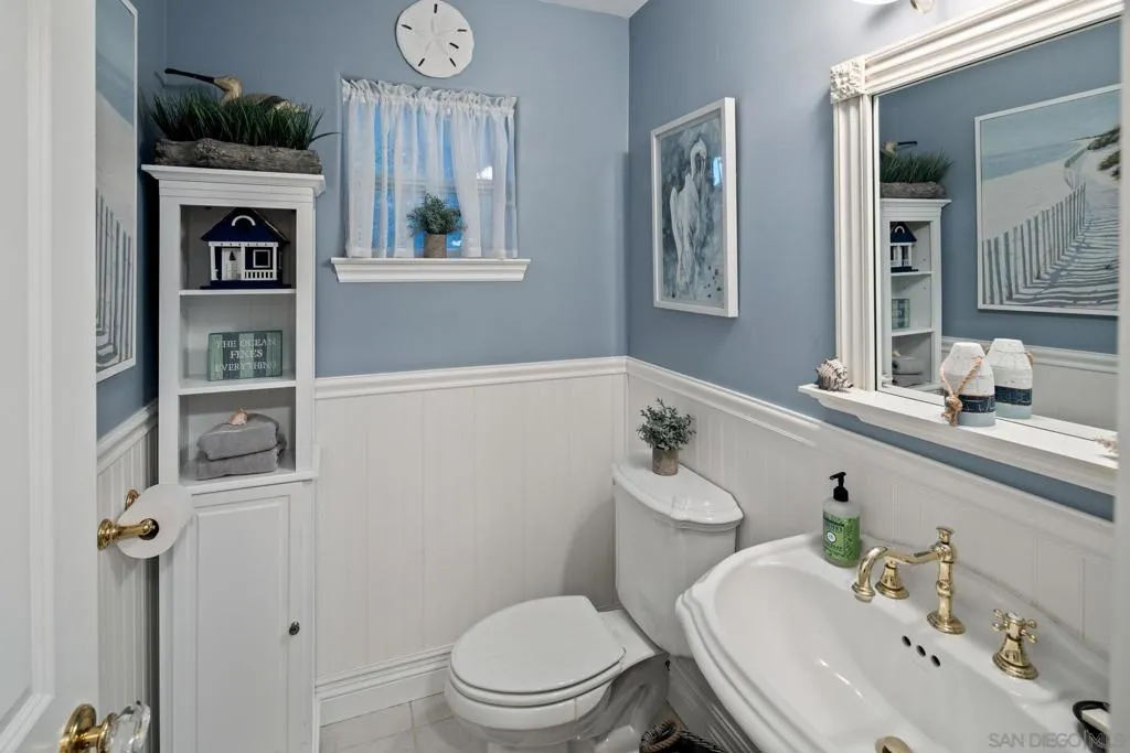 Powder room off kitchen.
