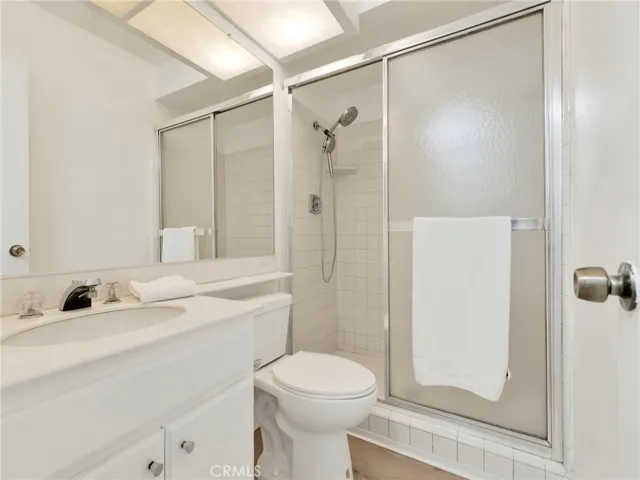 Large walk-in shower with new moveable showerhead.