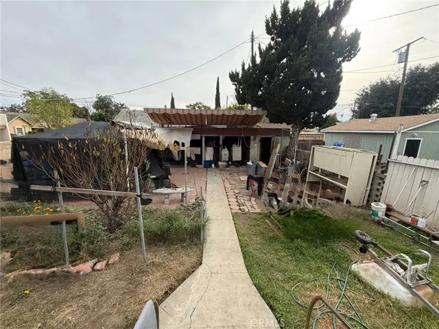 Large backyard with 2 car garage entry from alley way