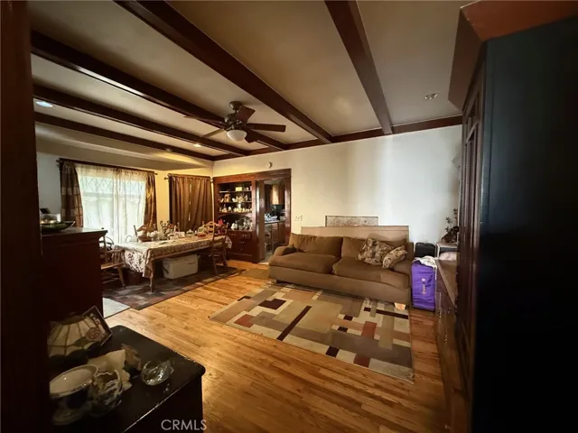 Living room with beautiful wooden beams on ceiling