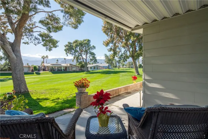 One of 2 Sunny South faceing Golf Course patios with gorgous Mountain Views.